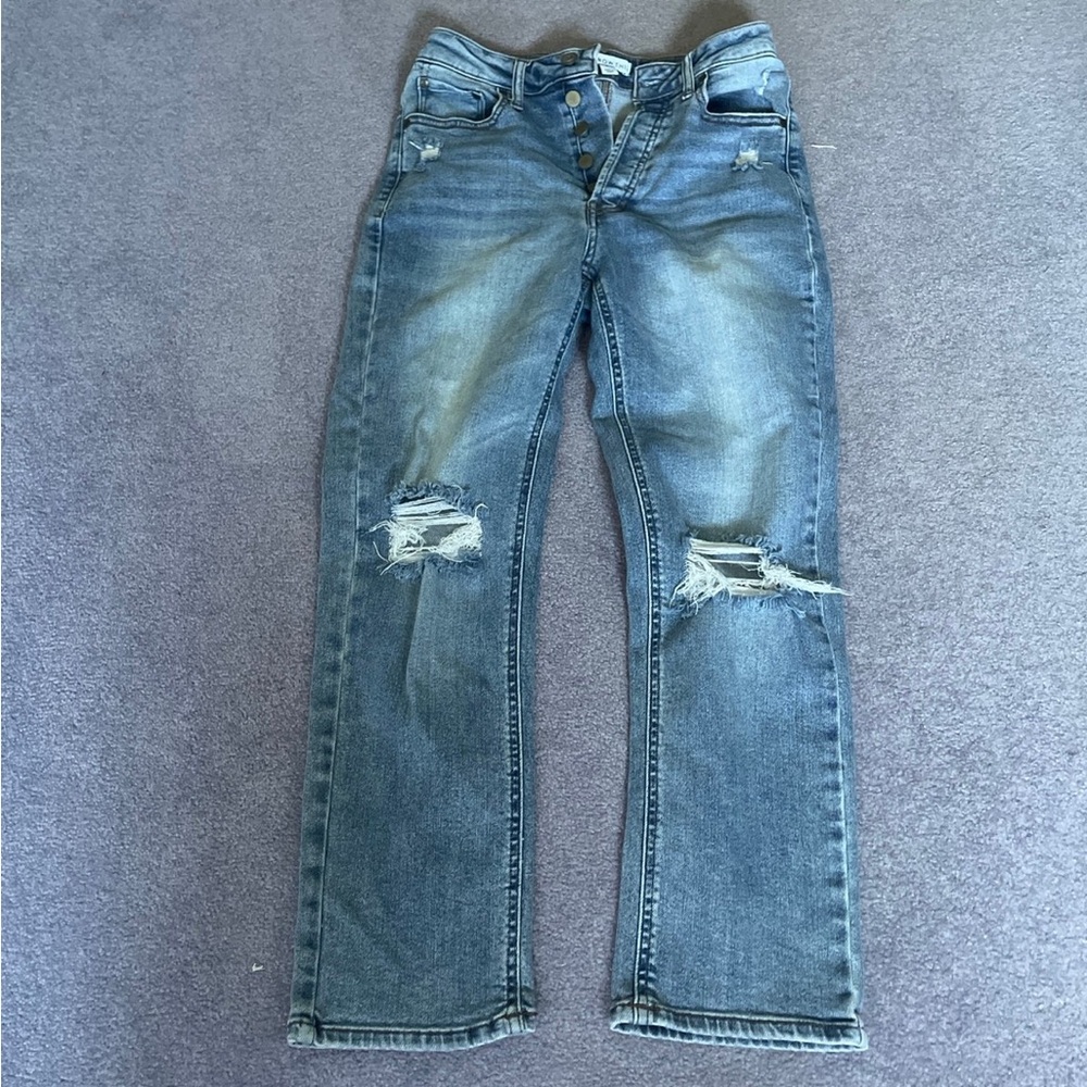 Distressed Light Blue Button-Fly Jeans